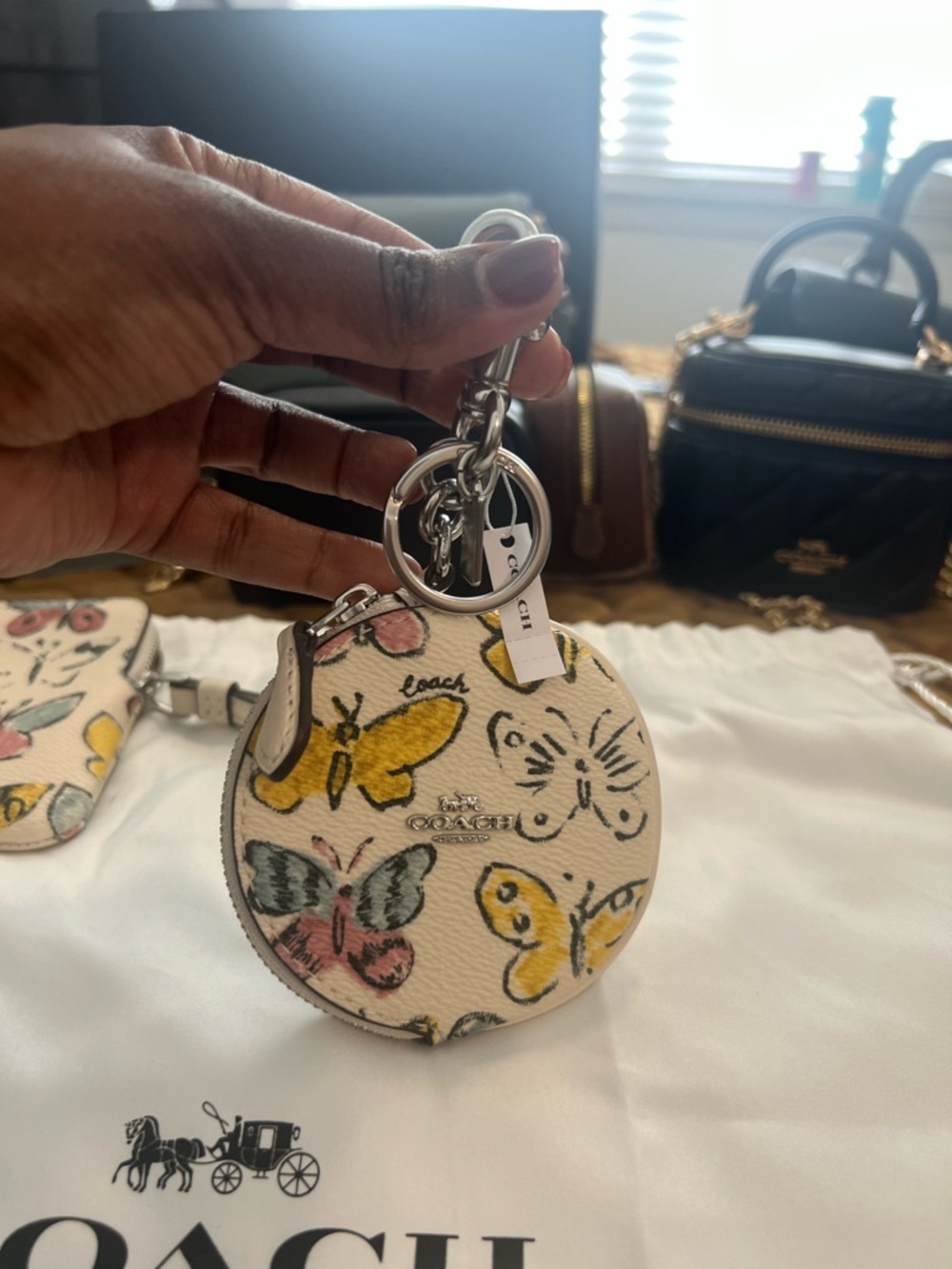 Coach Cream Butterfly Round Coin Keychain with Multicolor Print